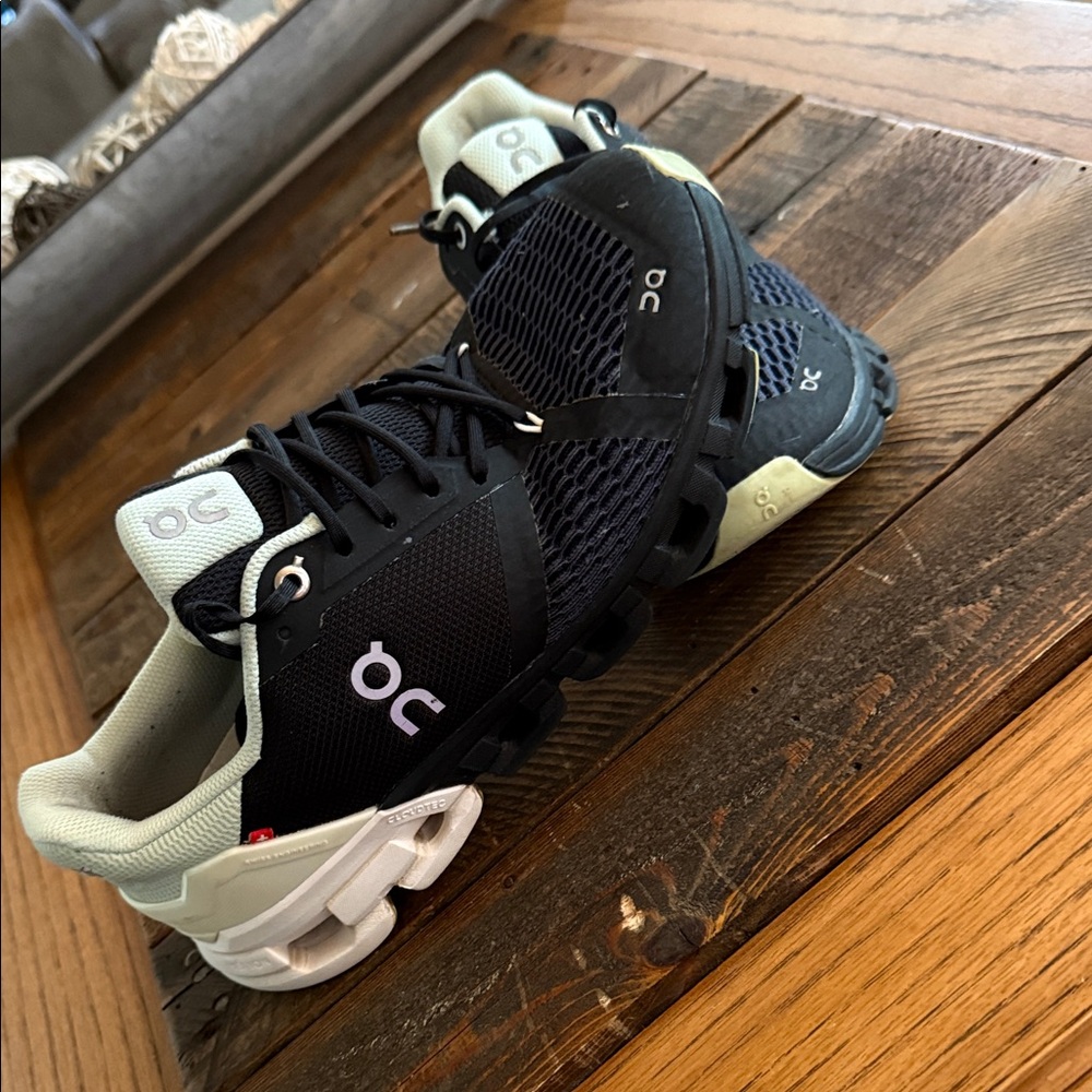 On Running Black and White Athletic Shoes